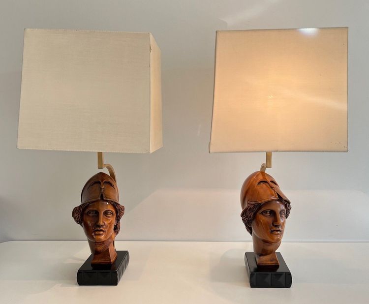 Pair of walnut lamps depicting the faces of helmeted soldiers. Italian work.