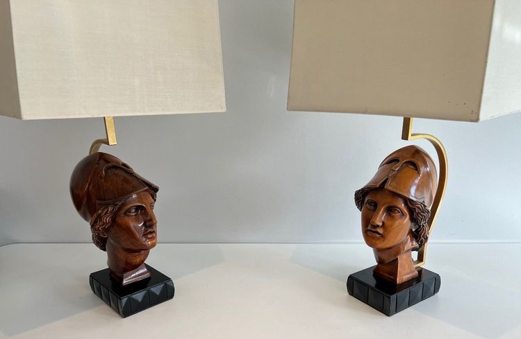 Pair of walnut lamps depicting the faces of helmeted soldiers. Italian work.
