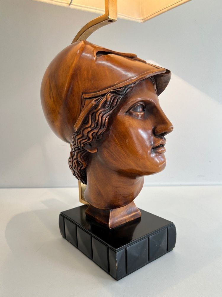 Pair of walnut lamps depicting the faces of helmeted soldiers. Italian work.