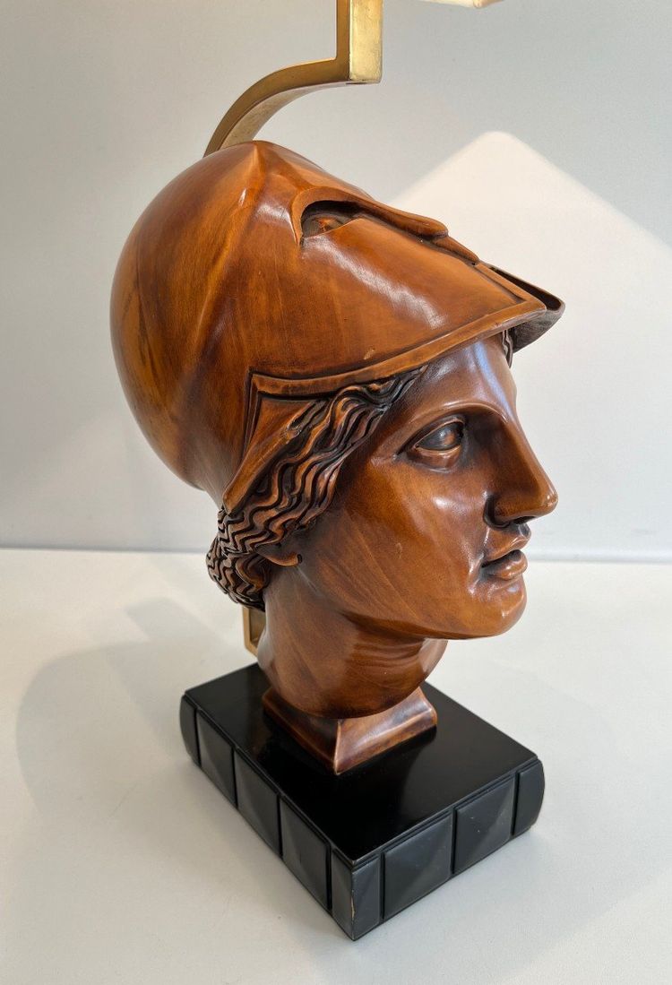 Pair of walnut lamps depicting the faces of helmeted soldiers. Italian work.