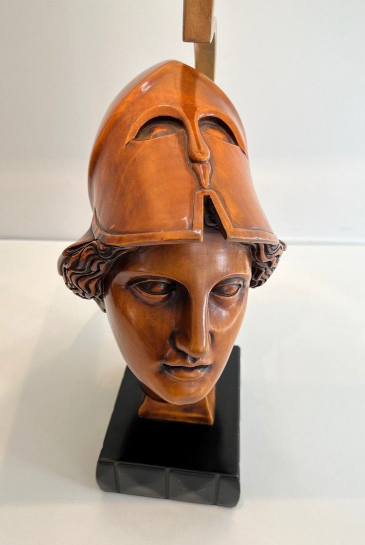 Pair of walnut lamps depicting the faces of helmeted soldiers. Italian work.