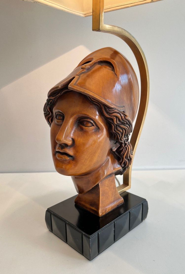 Pair of walnut lamps depicting the faces of helmeted soldiers. Italian work.