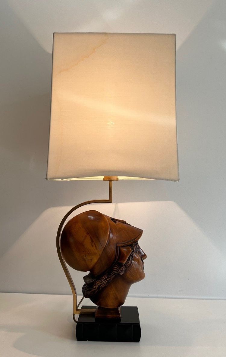 Pair of walnut lamps depicting the faces of helmeted soldiers. Italian work.