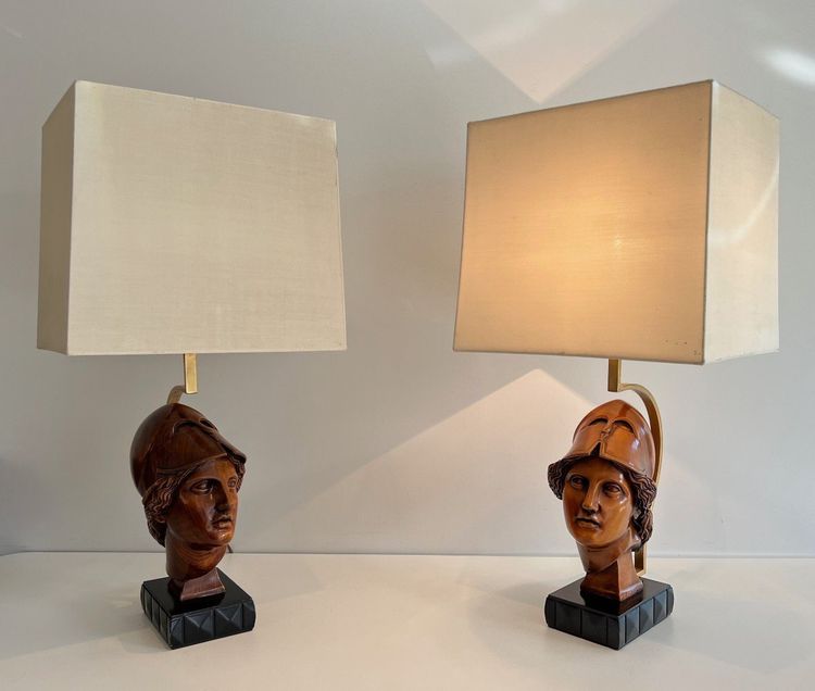 Pair of walnut lamps depicting the faces of helmeted soldiers. Italian work.