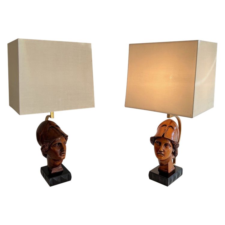 Pair of walnut lamps depicting the faces of helmeted soldiers. Italian work.