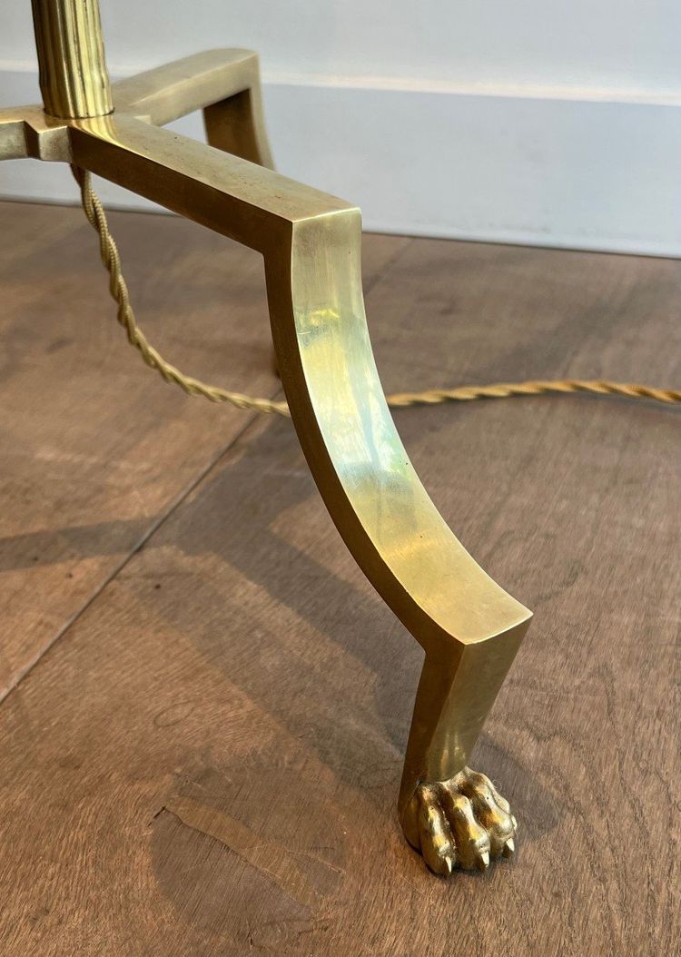 Brass reading lamp with removable, height-adjustable arm.