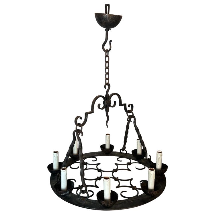 8-light round wrought iron chandelier. French Gothic work. Circa 1940