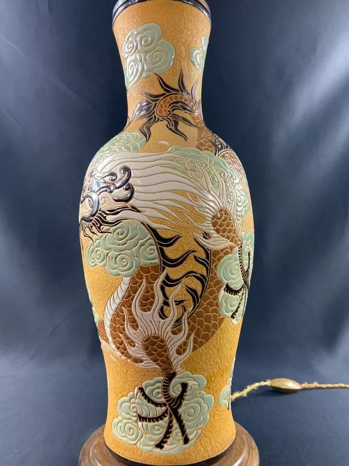 Very large BIEN HOA stoneware dragon lamp on yellow background Vietnam
