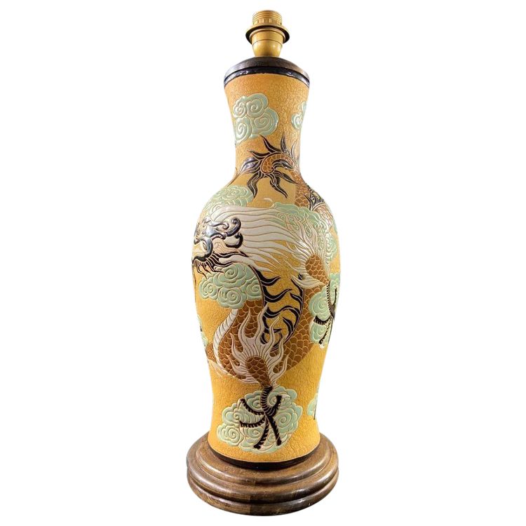 Very large BIEN HOA stoneware dragon lamp on yellow background Vietnam