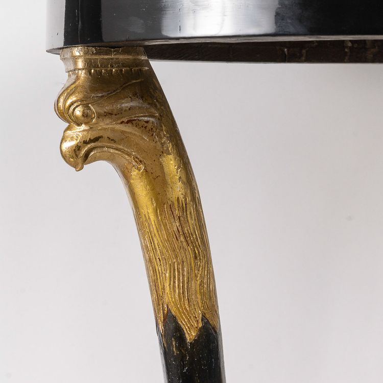 Black lacquered pedestal table decorated with eagle heads Consulat period (1799-1804)