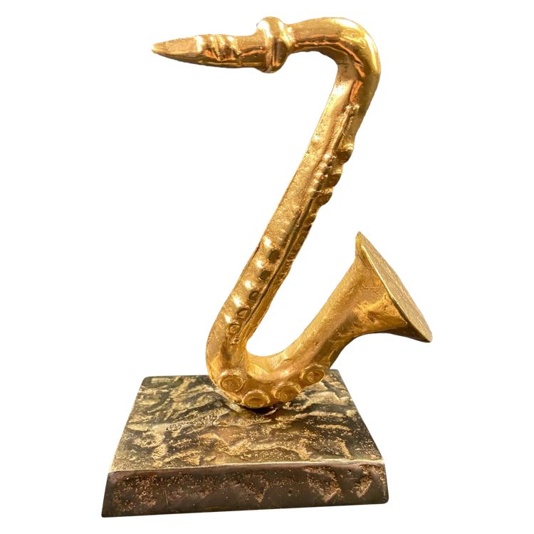 Carved saxophone subject in bronze signed Yves Lohé