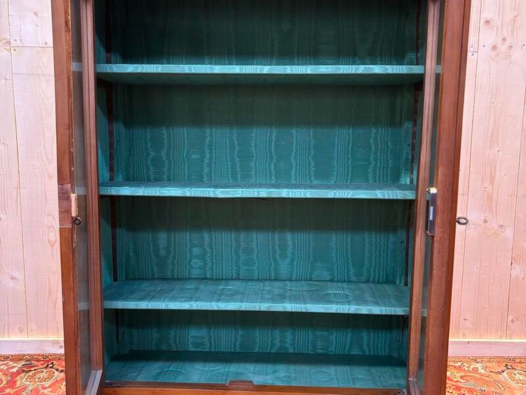 Libreria/vetrina in stile impero in legno di ciliegio.