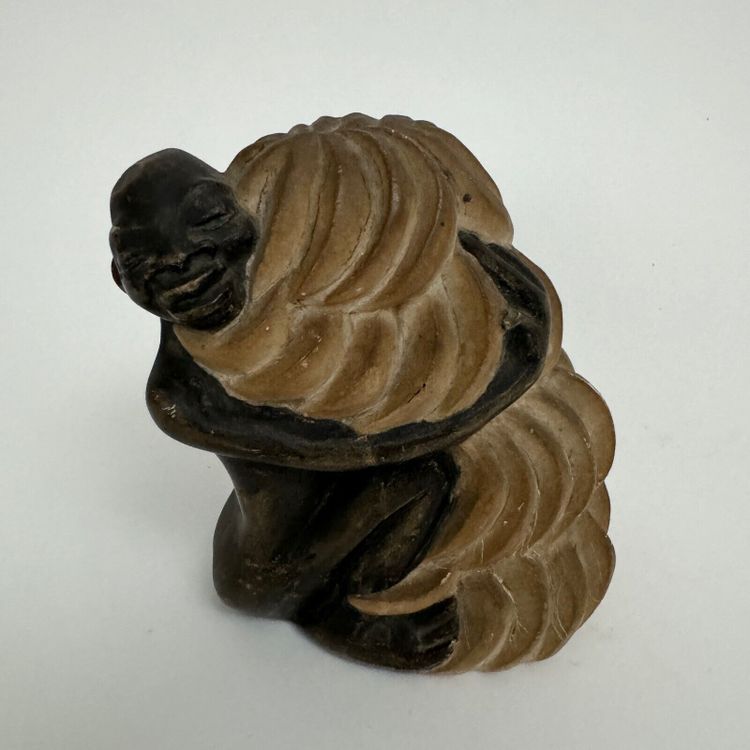 Scultura africanista 1930 soggetto femminile che tiene in mano un casco di banane