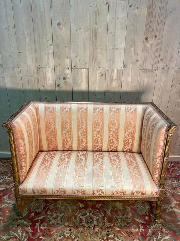 Louis XVI style bench in gilded wood.
