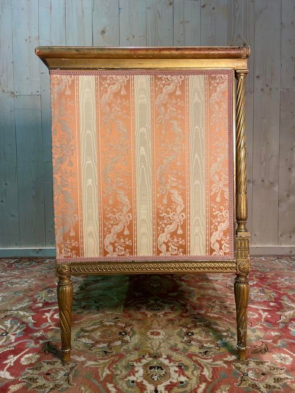 Louis XVI style bench in gilded wood.