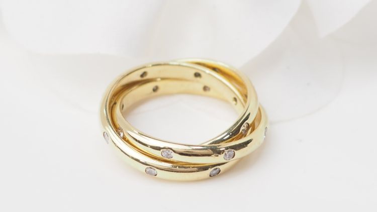 Three-ring wedding band in yellow gold and diamonds
