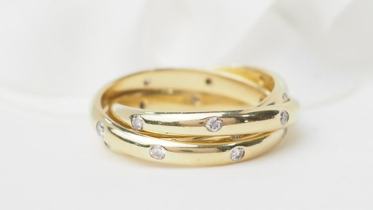 Three-ring wedding band in yellow gold and diamonds