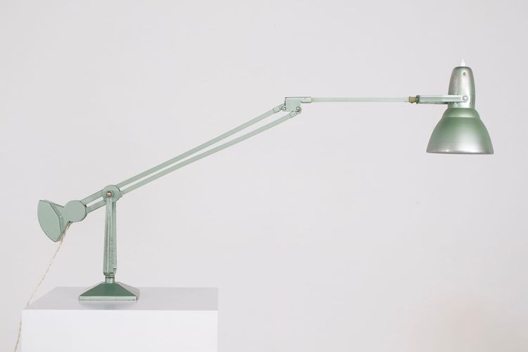 Workshop lamp with pendulum.