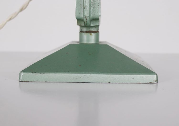 Workshop lamp with pendulum.