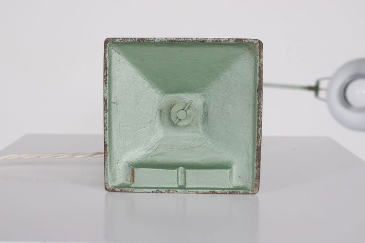 Workshop lamp with pendulum.