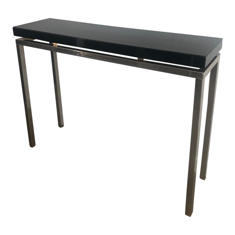 Chromed console with thick black lacquered top. French work. Circa 1970