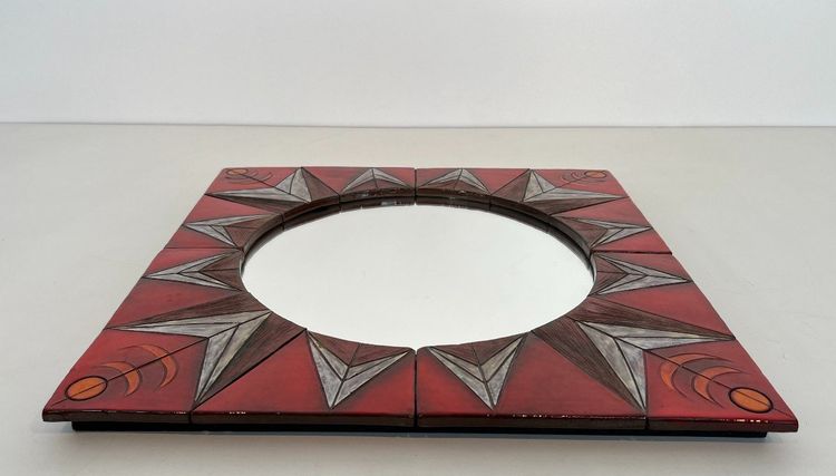 Ceramic Mirror Depicting a Stylized Sun on a Red Background Attributed to Oswal Tiberghien