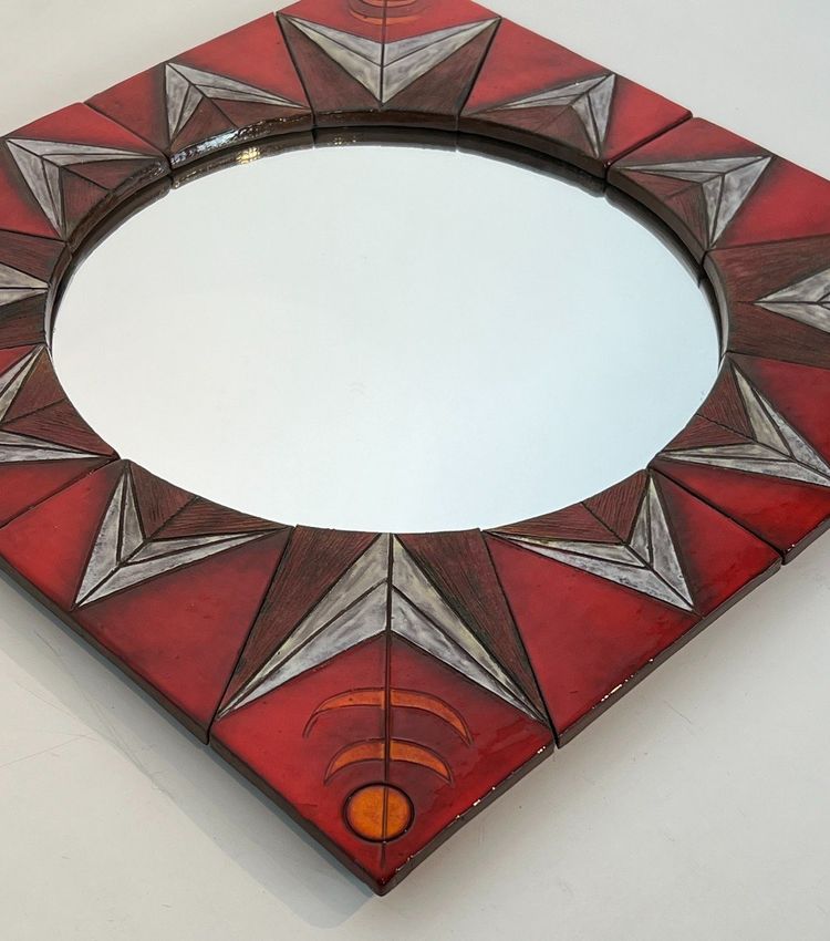 Ceramic Mirror Depicting a Stylized Sun on a Red Background Attributed to Oswal Tiberghien
