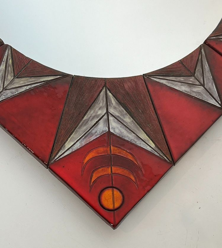 Ceramic Mirror Depicting a Stylized Sun on a Red Background Attributed to Oswal Tiberghien