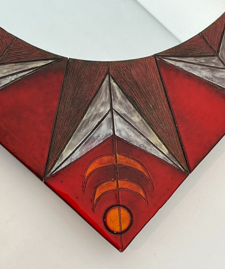 Ceramic Mirror Depicting a Stylized Sun on a Red Background Attributed to Oswal Tiberghien