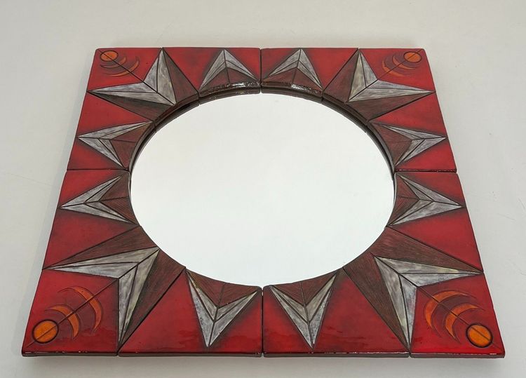 Ceramic Mirror Depicting a Stylized Sun on a Red Background Attributed to Oswal Tiberghien