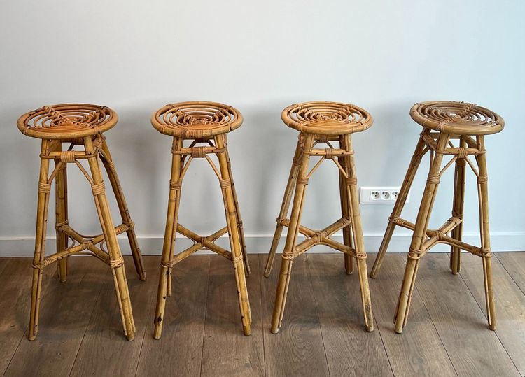 Set of 4 rattan stools. French work. Circa 1970