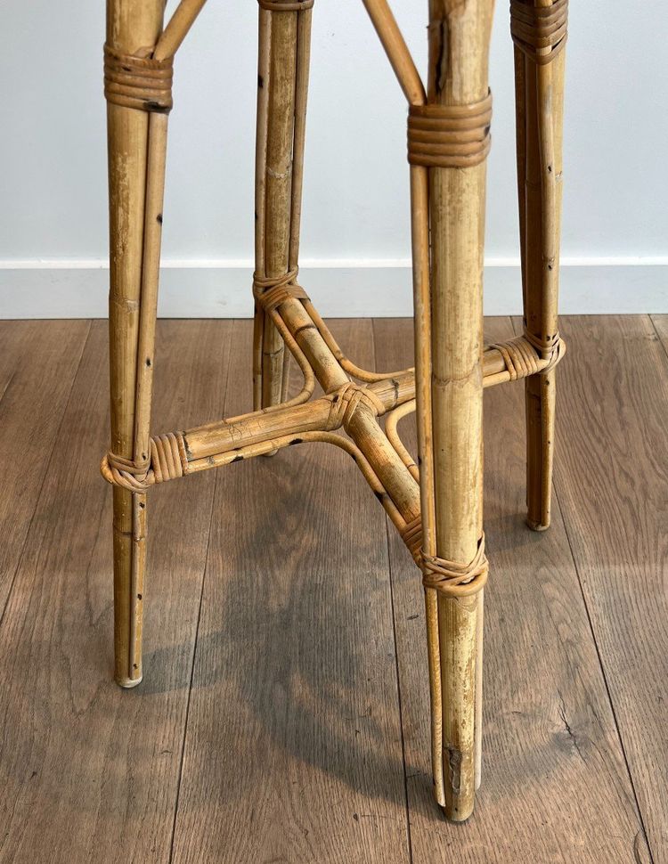 Set of 4 rattan stools. French work. Circa 1970