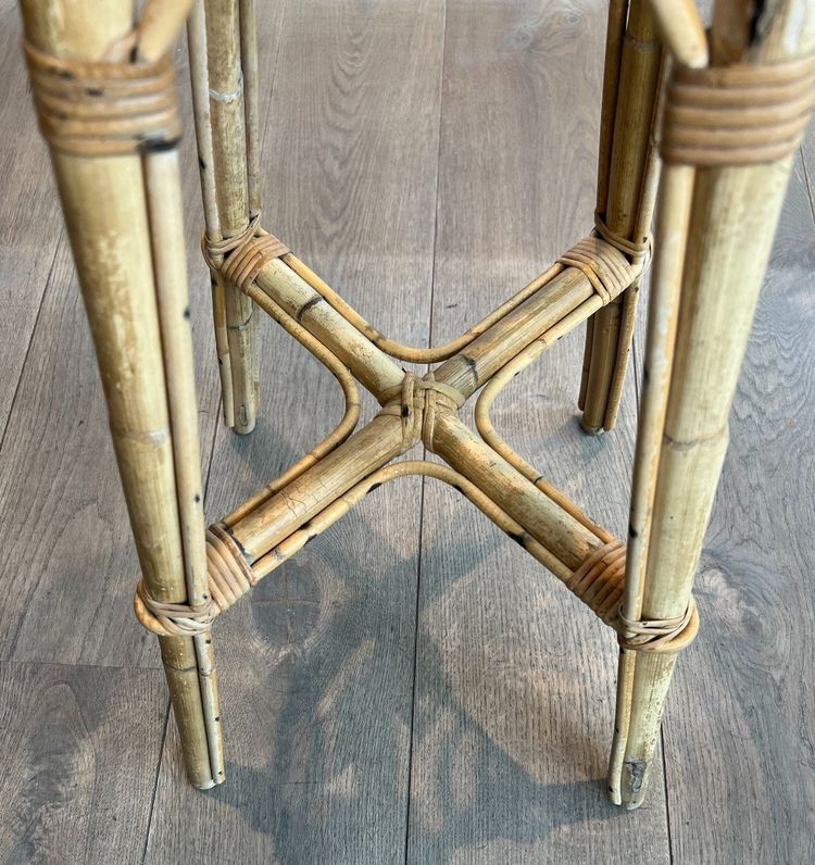 Set of 4 rattan stools. French work. Circa 1970