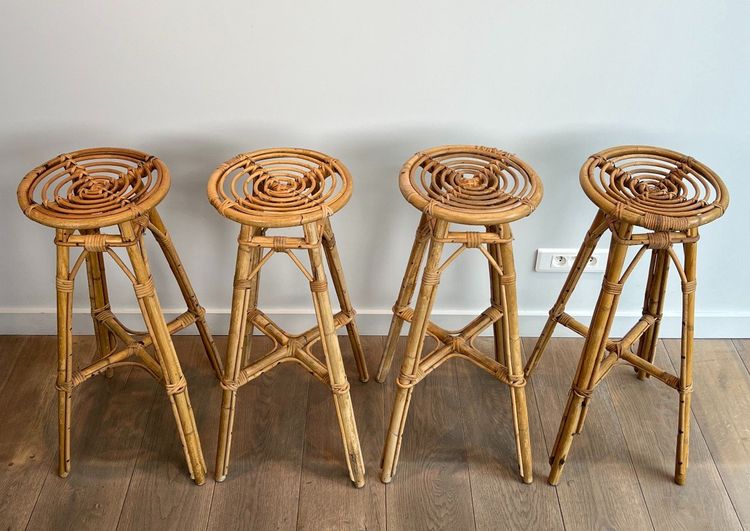 Set of 4 rattan stools. French work. Circa 1970