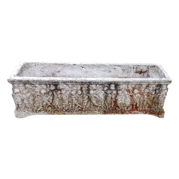 Old planter with character decoration