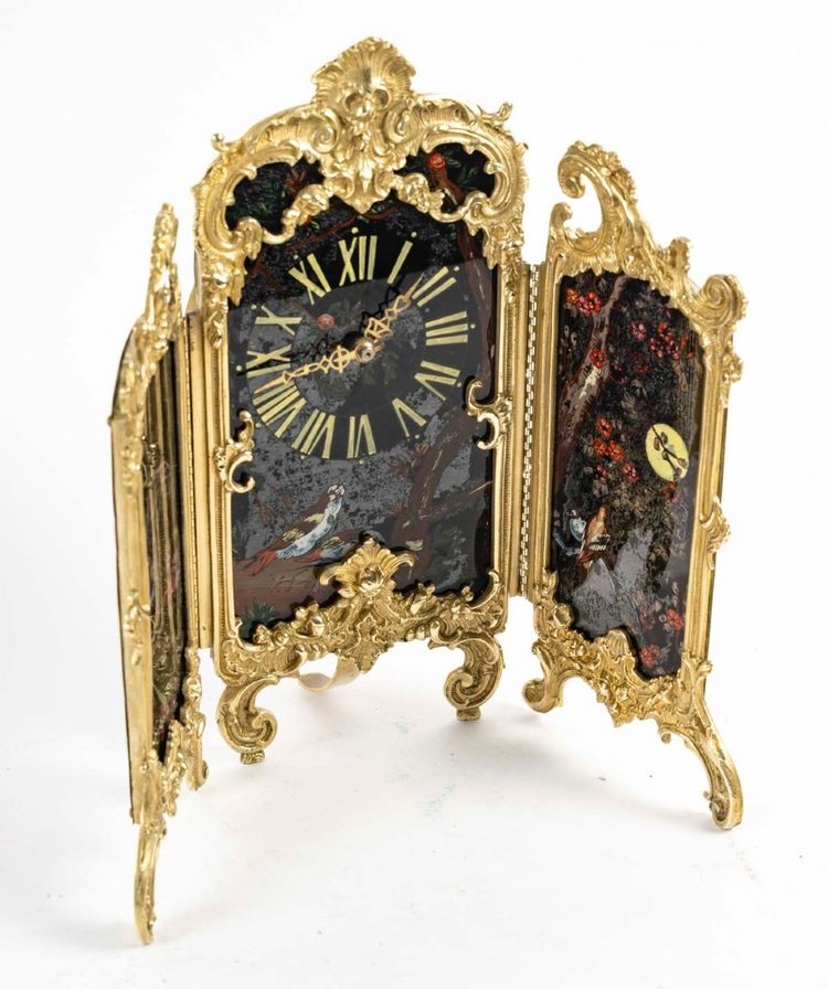 An Art Nouveau Gilt Bronze and Painted Glass Screen Clock