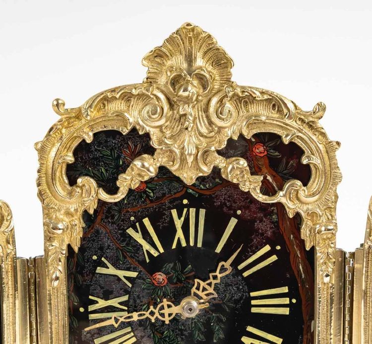 An Art Nouveau Gilt Bronze and Painted Glass Screen Clock