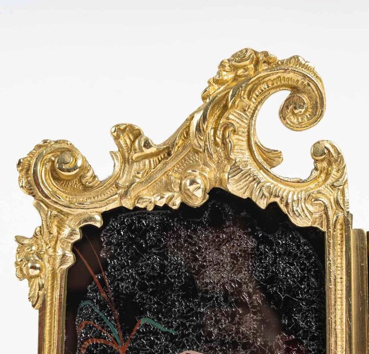 An Art Nouveau Gilt Bronze and Painted Glass Screen Clock