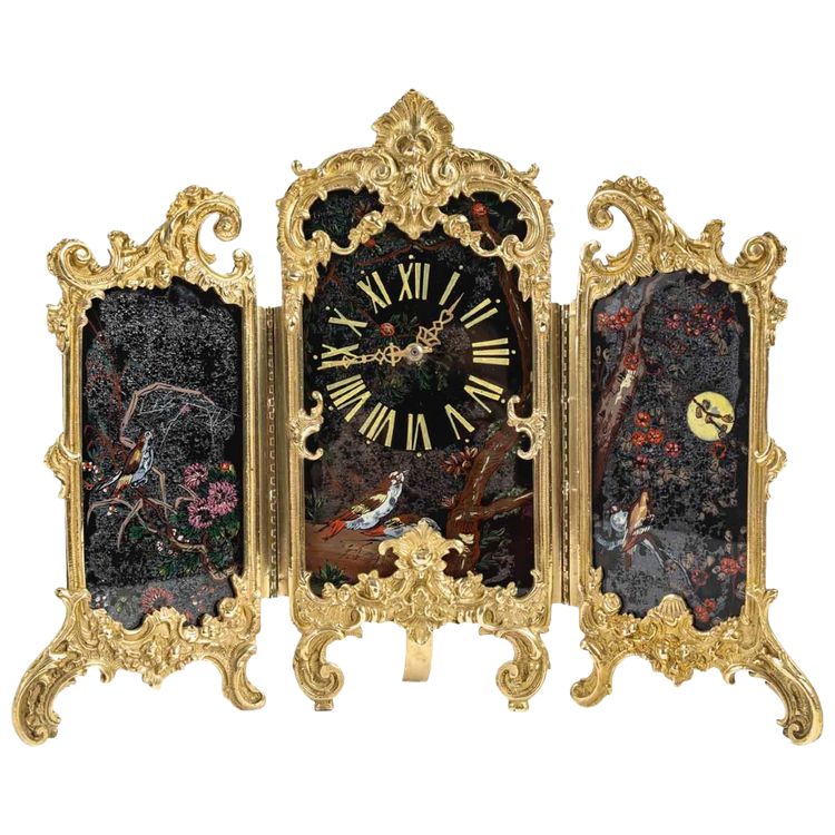 An Art Nouveau Gilt Bronze and Painted Glass Screen Clock