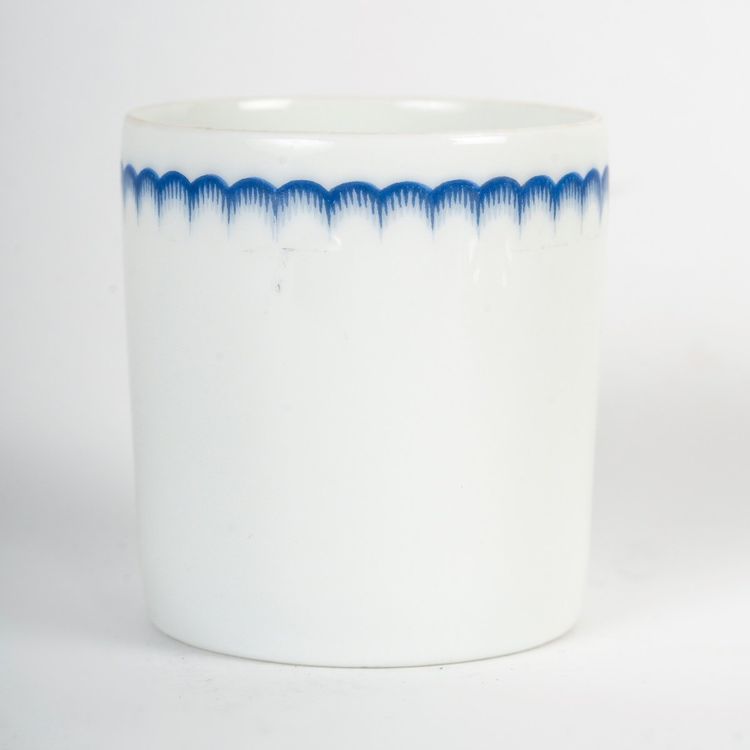 A Series Of Porcelain And Solid Silver Cups