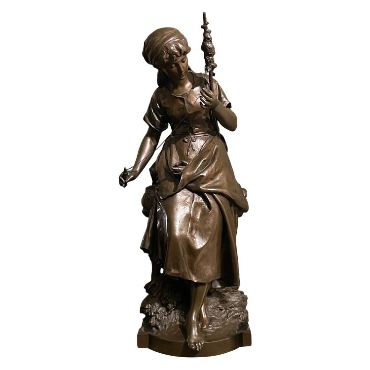 Scultura in bronzo "La filatrice" di Mathurin Moreau