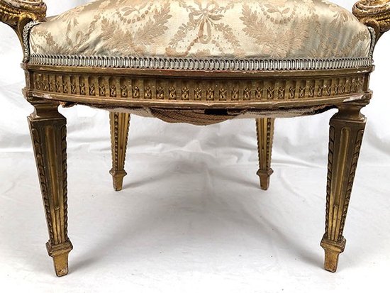 Armchair in carved and gilded wood, Louis XVI style, circa 1900