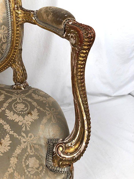 Armchair in carved and gilded wood, Louis XVI style, circa 1900