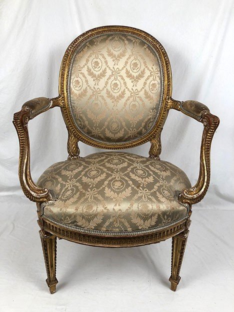 Armchair in carved and gilded wood, Louis XVI style, circa 1900