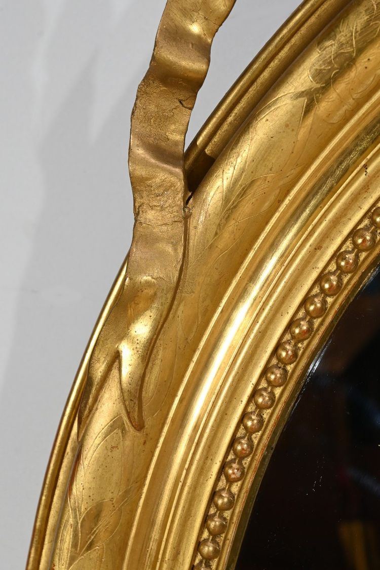 Oval mirror in gilded wood, Louis XVI style, Napoleon III period - Mid-19th century