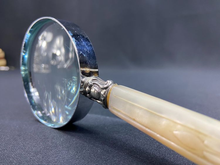Magnifying glass with mother-of-pearl handle and silver ferrule