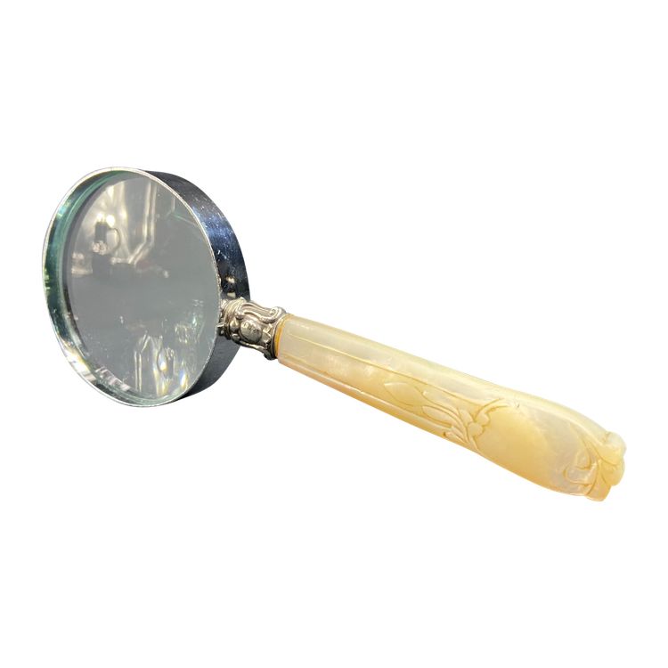 Magnifying glass with mother-of-pearl handle and silver ferrule