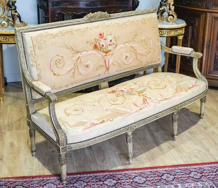 A large Aubusson sofa in carved, lacquered and gilded wood, late 19th century