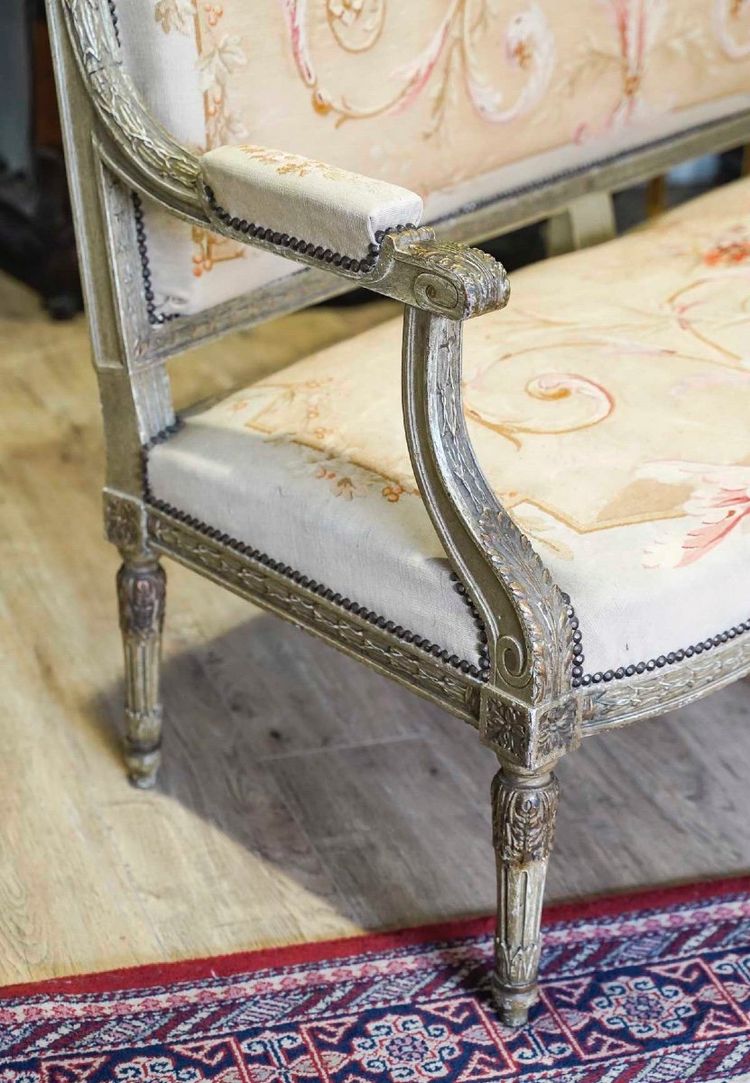 A large Aubusson sofa in carved, lacquered and gilded wood, late 19th century