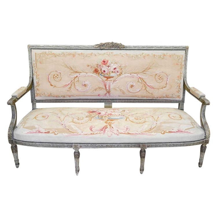 A large Aubusson sofa in carved, lacquered and gilded wood, late 19th century